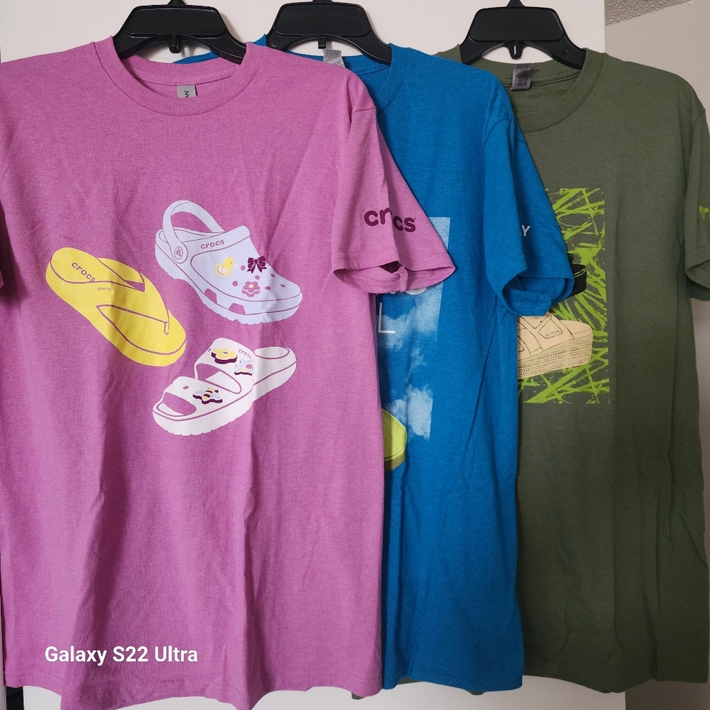 3 New medium crocs tshirts 3 for 10$